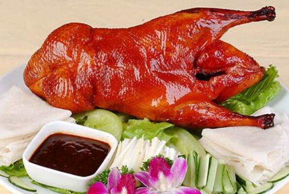 中国十大地方名吃 重庆酸辣粉上榜，北京烤鸭排名第一